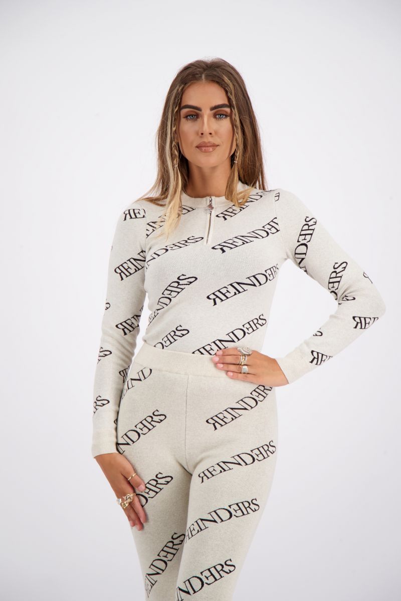 REINDERS TOP ZIPPER ALL OVER PRINT